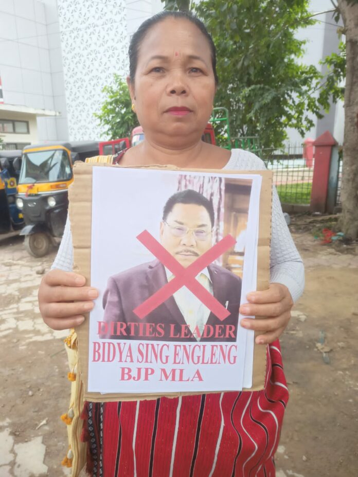 protest over viral pornography video of Diphu MLA Bidyasing Engleng