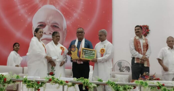 DHSK College Principal Dr. Saikia Honoured for Social Service