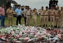 Majuli Police Destroy Illegal Liquor Worth Over Rs 15 Lakh Following Court Order Majuli Police Destroy Illegal Liquor Worth Over Rs 15 Lakh Following Court Order