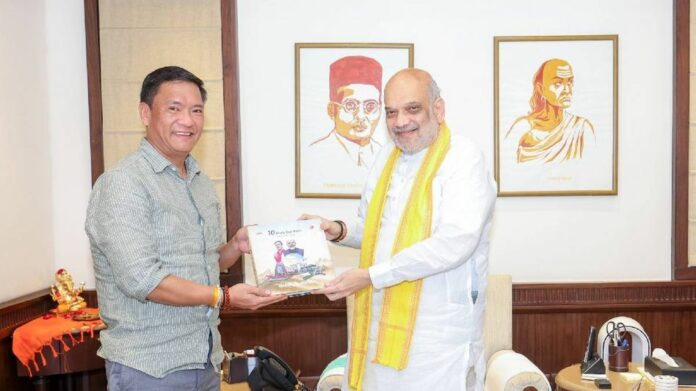 Pema Khandu presents 10-year Arunachal development report to Amit Shah